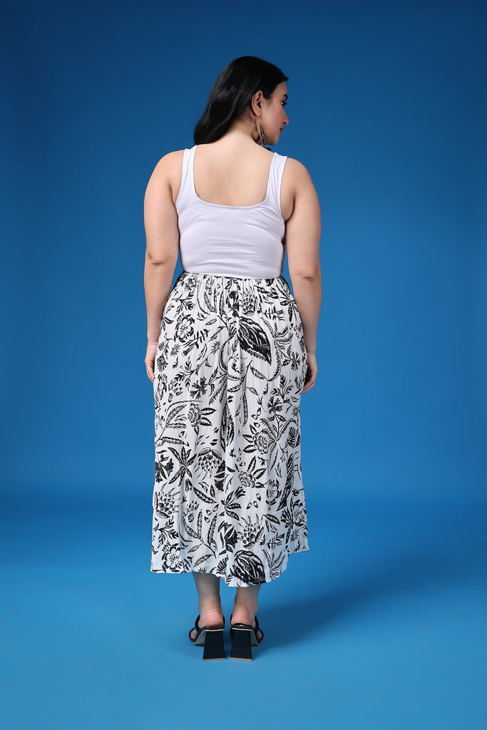 Model wearing Viscose Crepe Maxi Dress with Pattern type: Leaf -4
