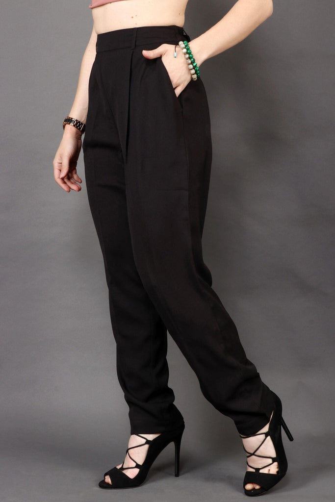 Model wearing Poly Crepe Trousers with Pattern type: Solid-4