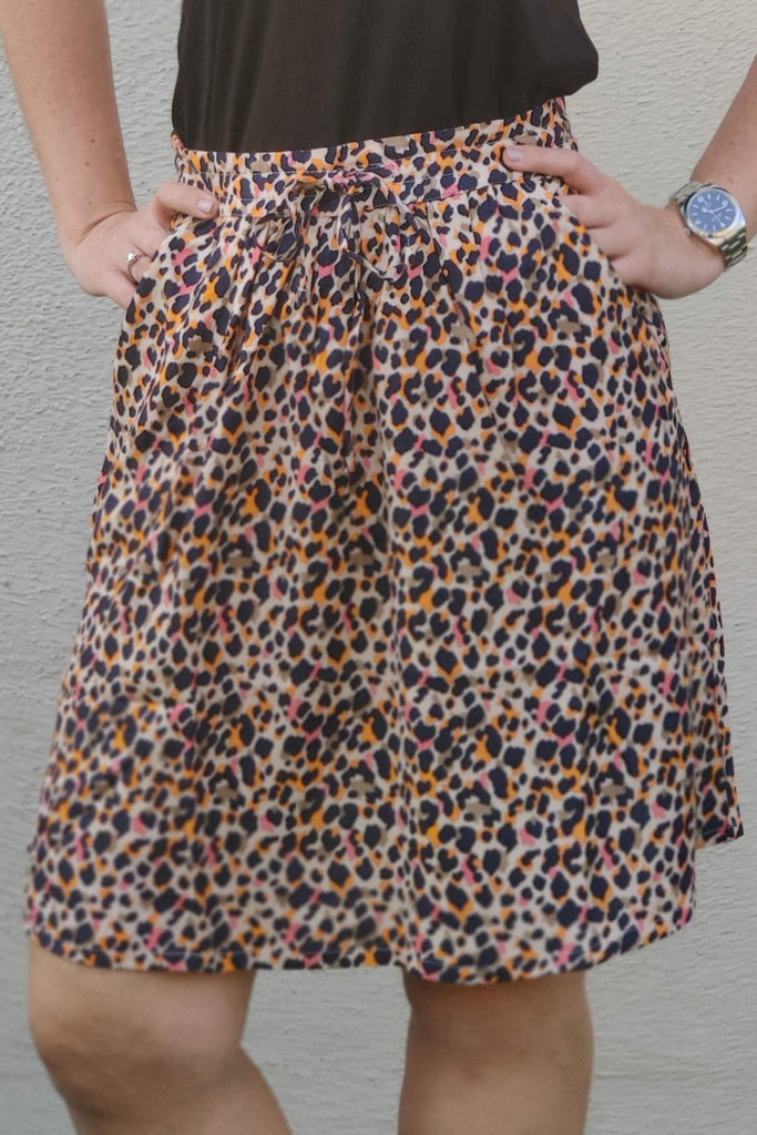 Model wearing Rayon Mini Skirt with Pattern type: Leopard-3