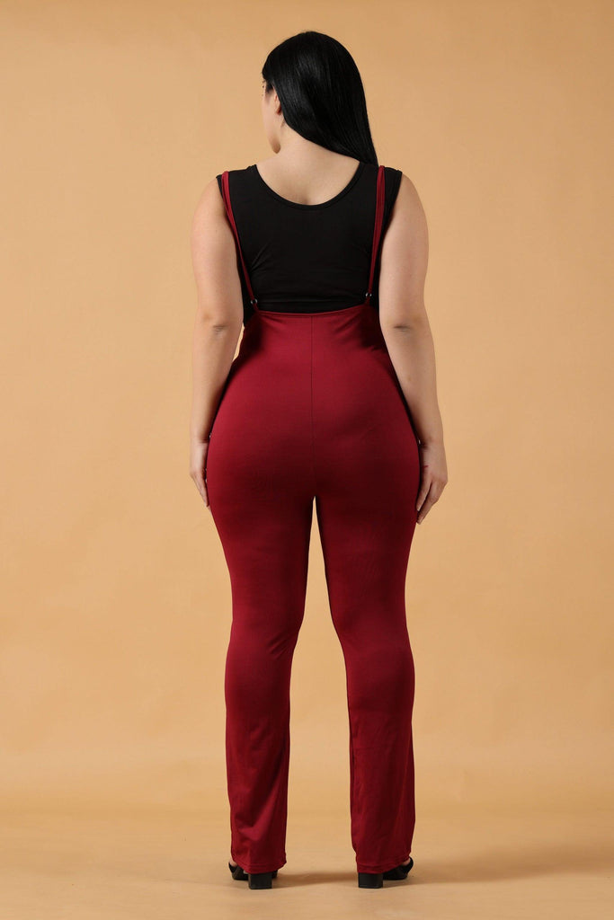Model wearing Polyester Elastane Jumpsuit with Pattern type: Solid-7
