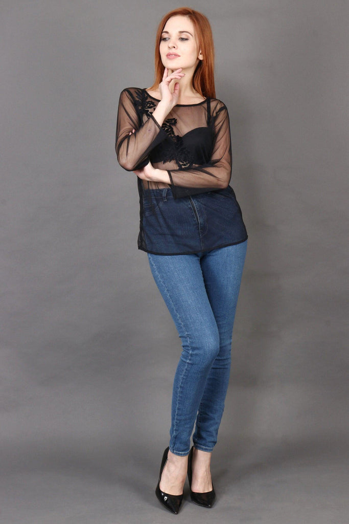 Model wearing Polyster Georgette Top with Pattern type: Solid-2