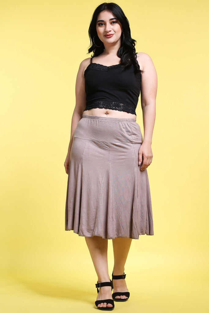 Model wearing Viscose Lycra Midi Skirt with Pattern type: Solid-1