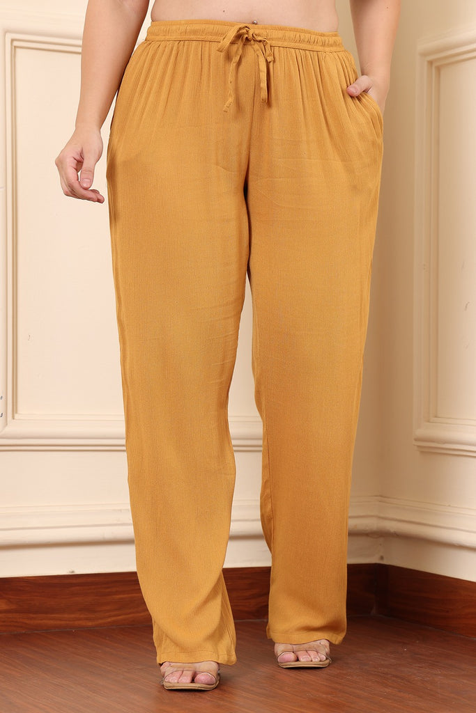 Model wearing Viscose Crepe Pant with Pattern type: Solid-1