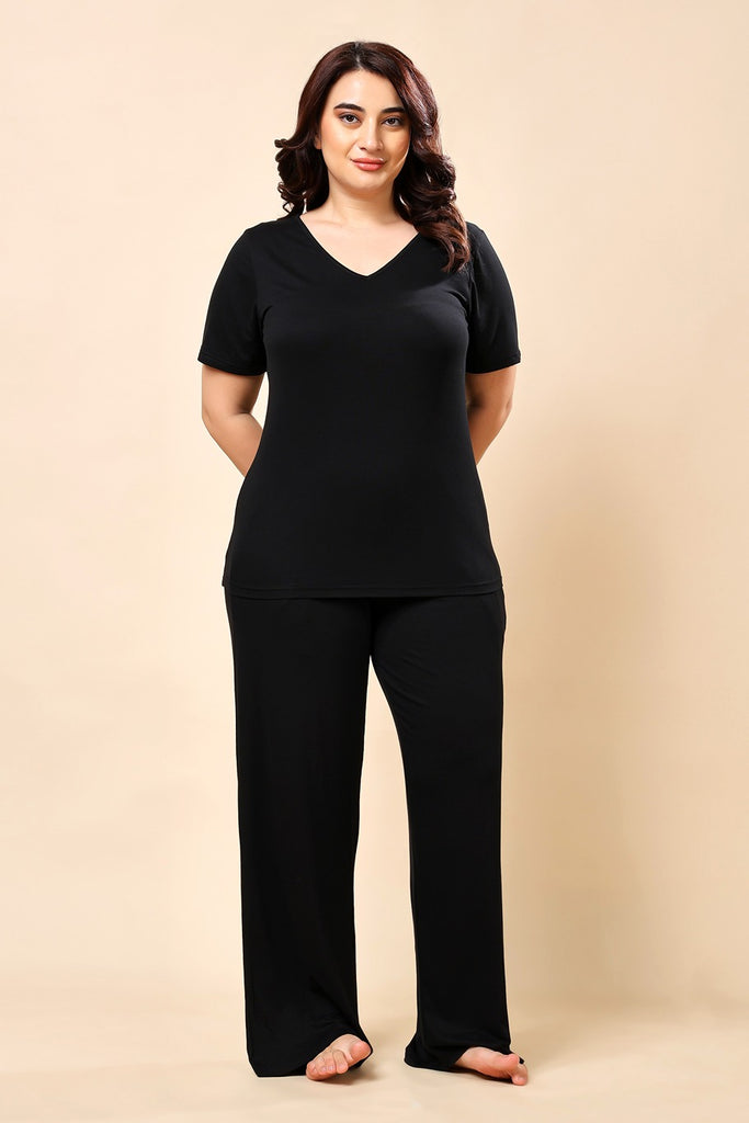 Model wearing Viscose Lycra Night Suit Set with Pattern type: Solid-1