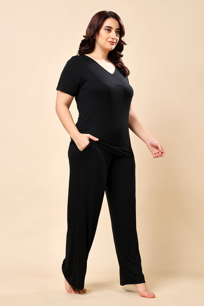 Model wearing Viscose Lycra Night Suit Set with Pattern type: Solid-2