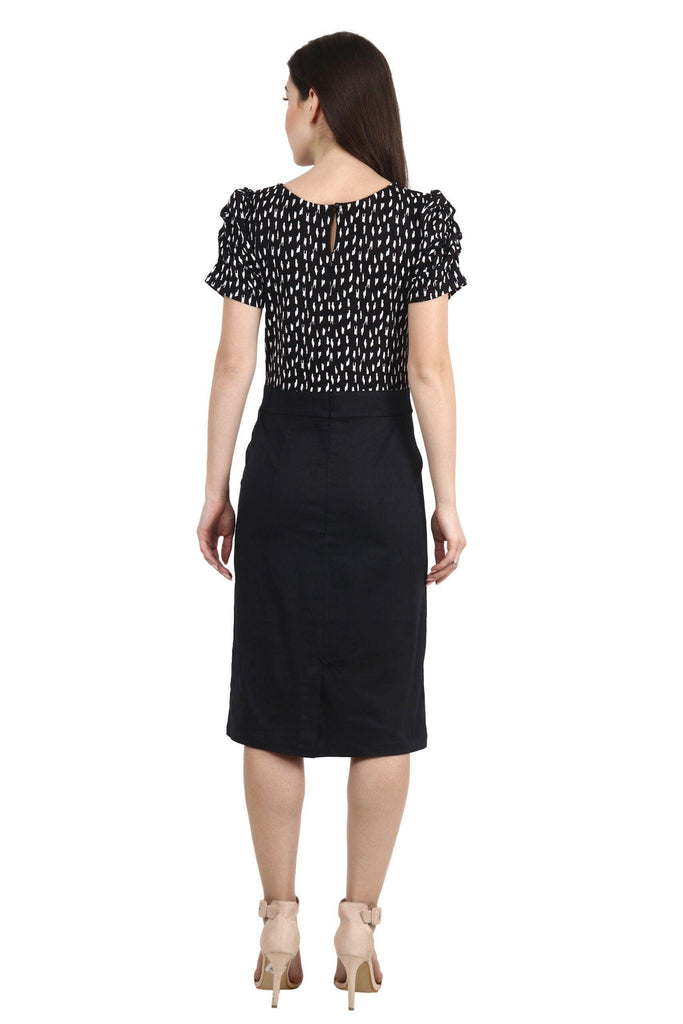 Model wearing Cotton Lycra Midi Dress with Pattern type: Graphic-2