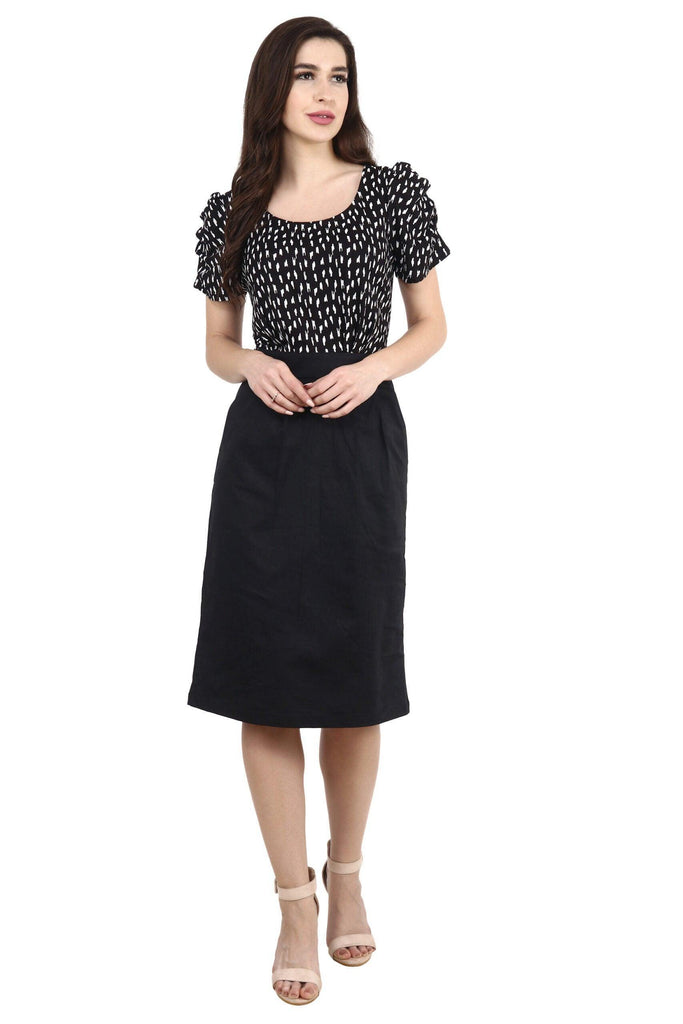 Model wearing Cotton Lycra Midi Dress with Pattern type: Graphic-5