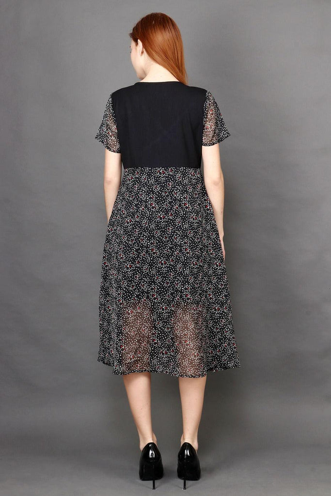 Model wearing Polyster Georgette Midi Dress with Pattern type: Floral -1