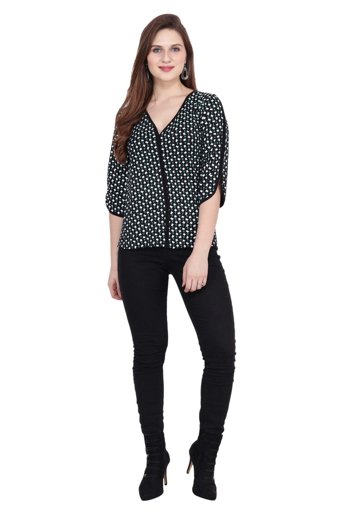 Model wearing Viscose Lycra Top with Pattern type: Graphic-2