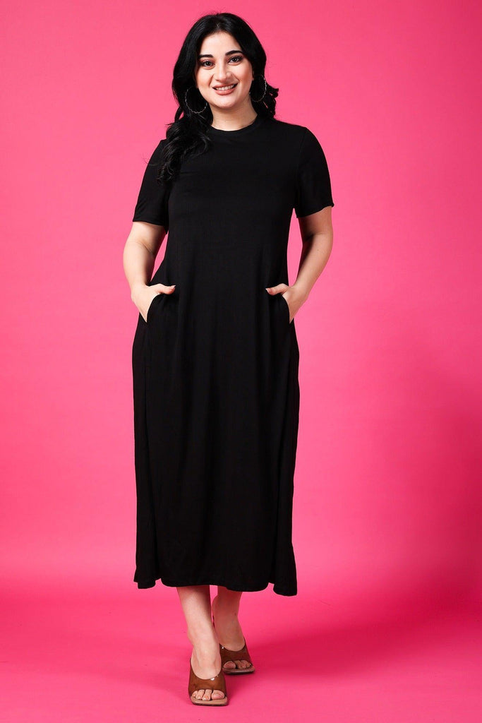 Model wearing Cotton Midi Dress with Pattern type: Solid-1