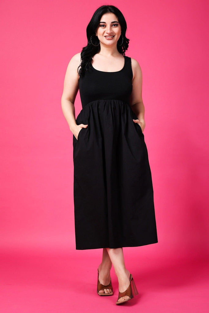 Model wearing Cotton Blended Midi Dress with Pattern type: Solid-1