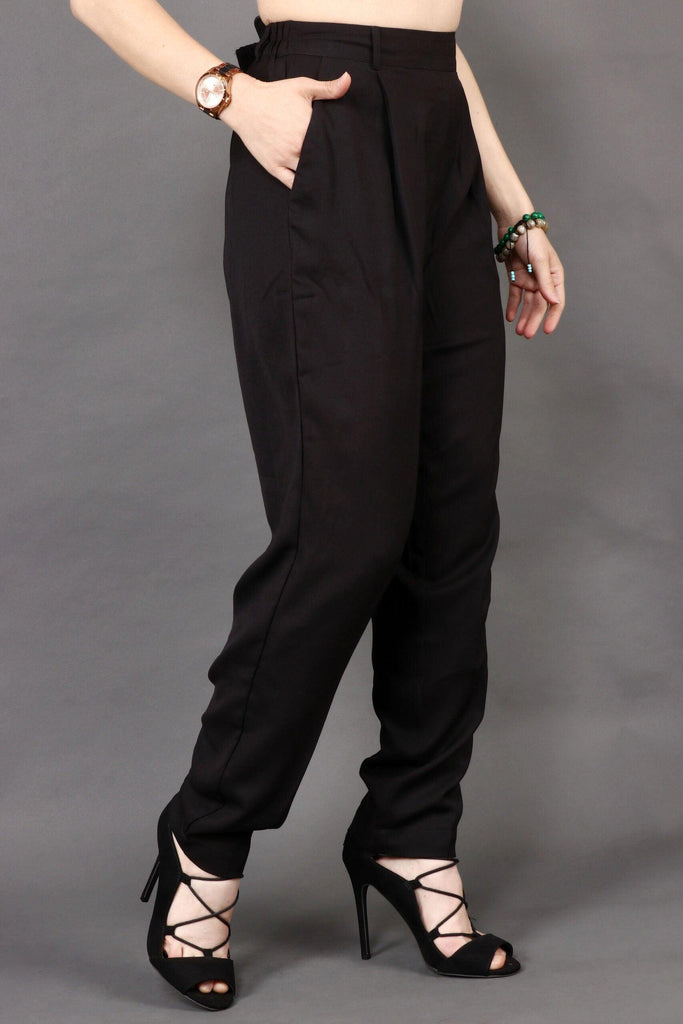 Model wearing Poly Crepe Trousers with Pattern type: Solid-1
