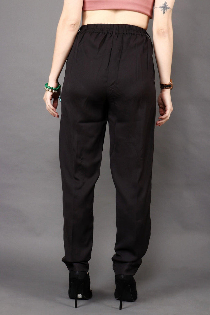 Model wearing Poly Crepe Trousers with Pattern type: Solid-3