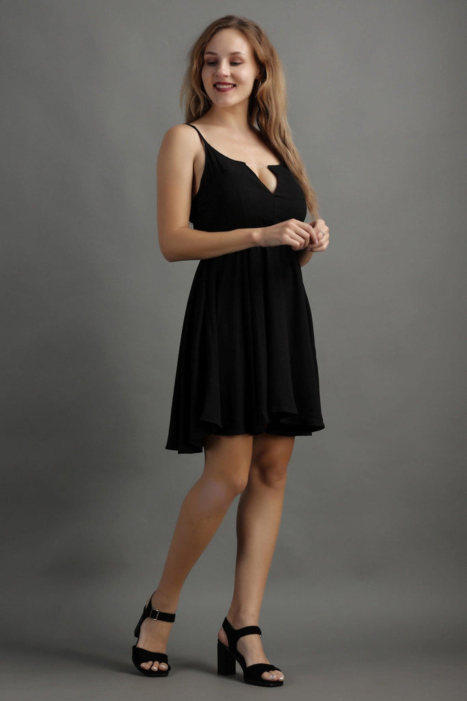 Model wearing Bubble Moss Mini Dress with Pattern type: Solid-1