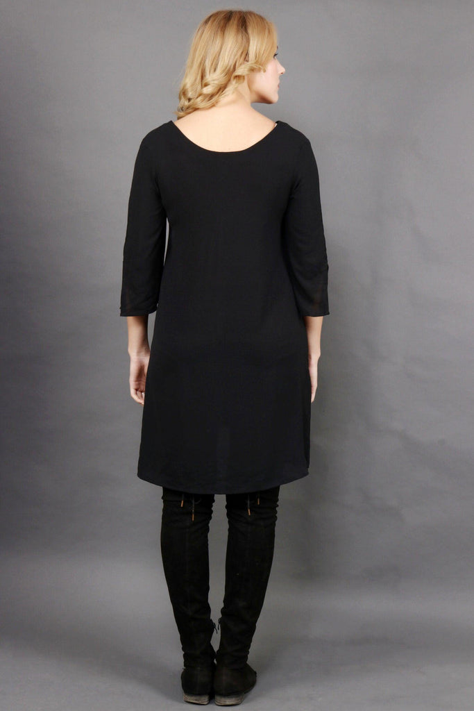 Model wearing Bubble Moss Midi Dress with Pattern type: Solid-5