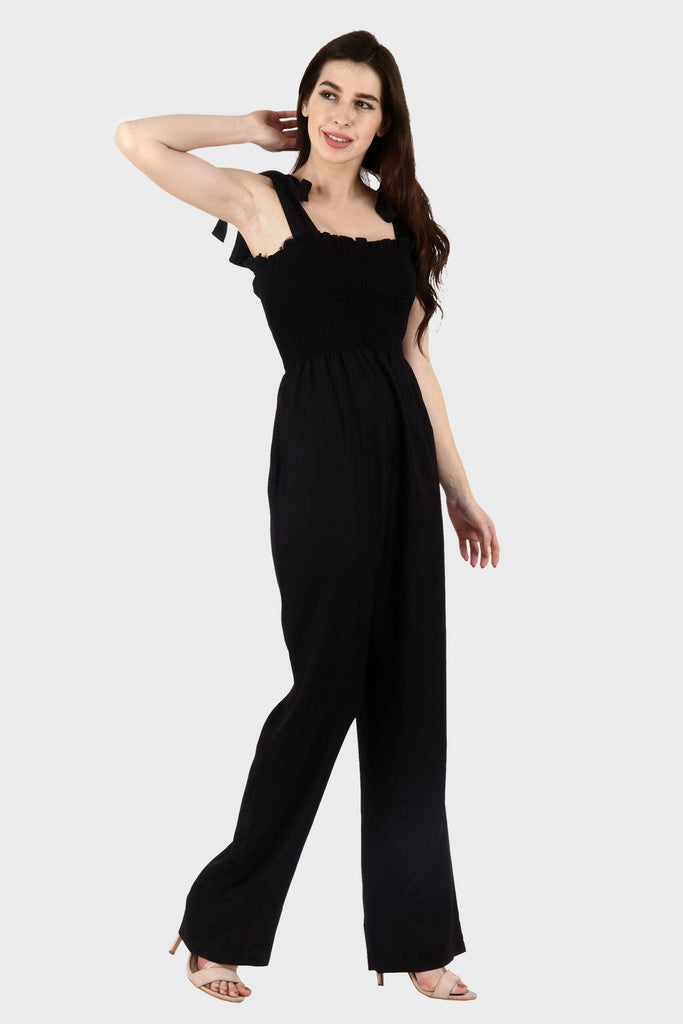 Model wearing Rayon Jumpsuit with Pattern type: Solid-1
