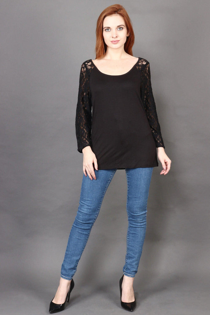 Model wearing Viscose Elastane Top with Pattern type: Solid-2
