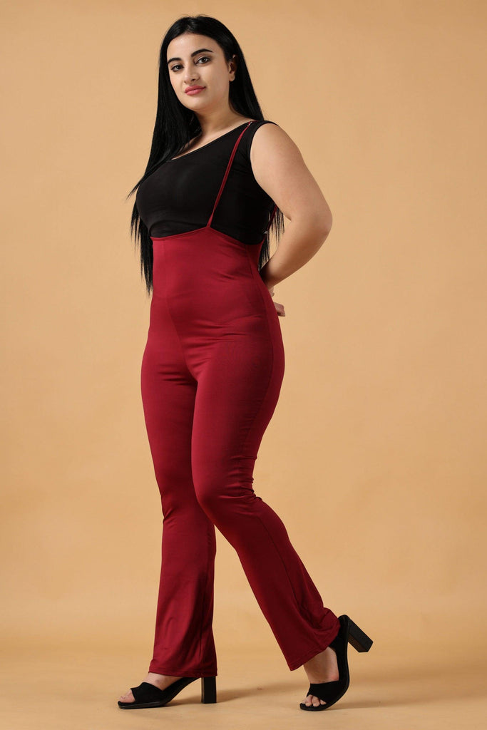Model wearing Polyester Elastane Jumpsuit with Pattern type: Solid-4