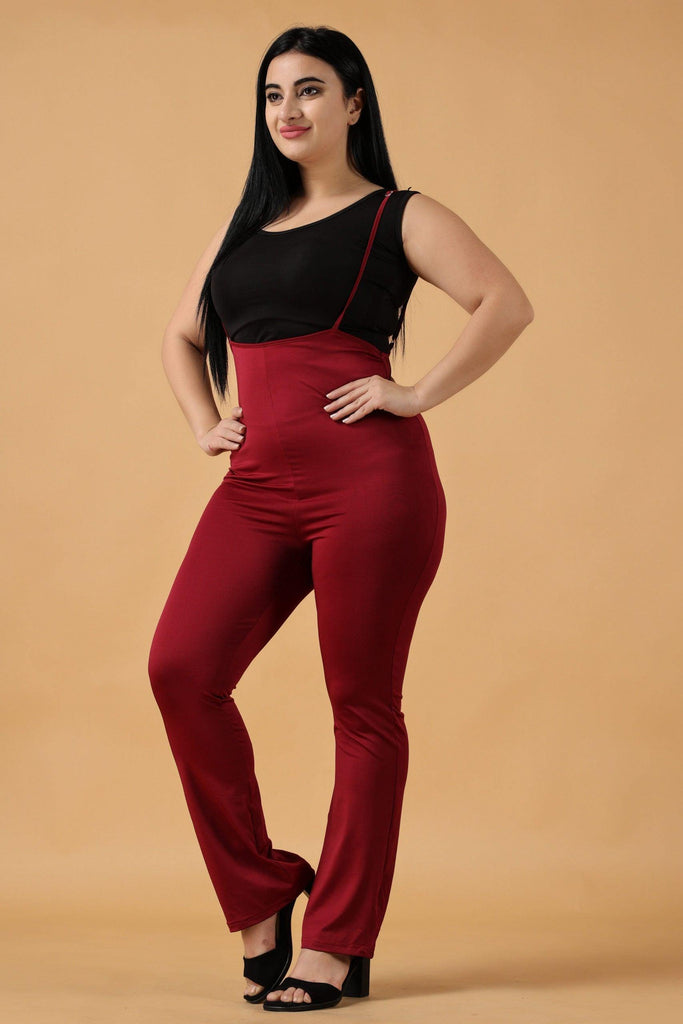 Model wearing Polyester Elastane Jumpsuit with Pattern type: Solid-5