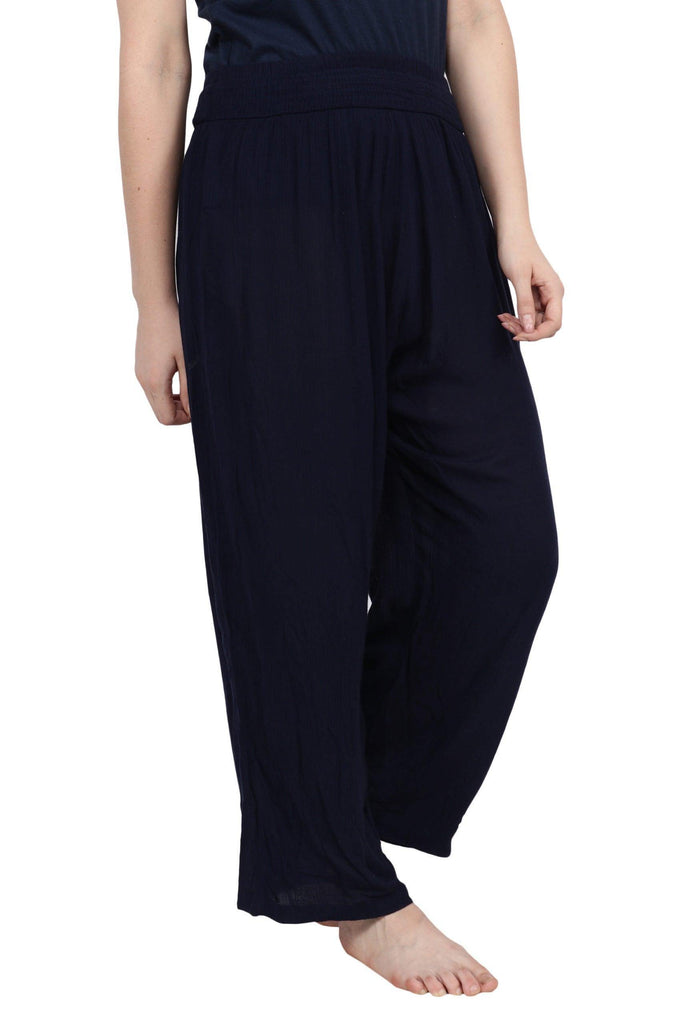 Model wearing Viscose Crepe Trousers with Pattern type: Solid-1