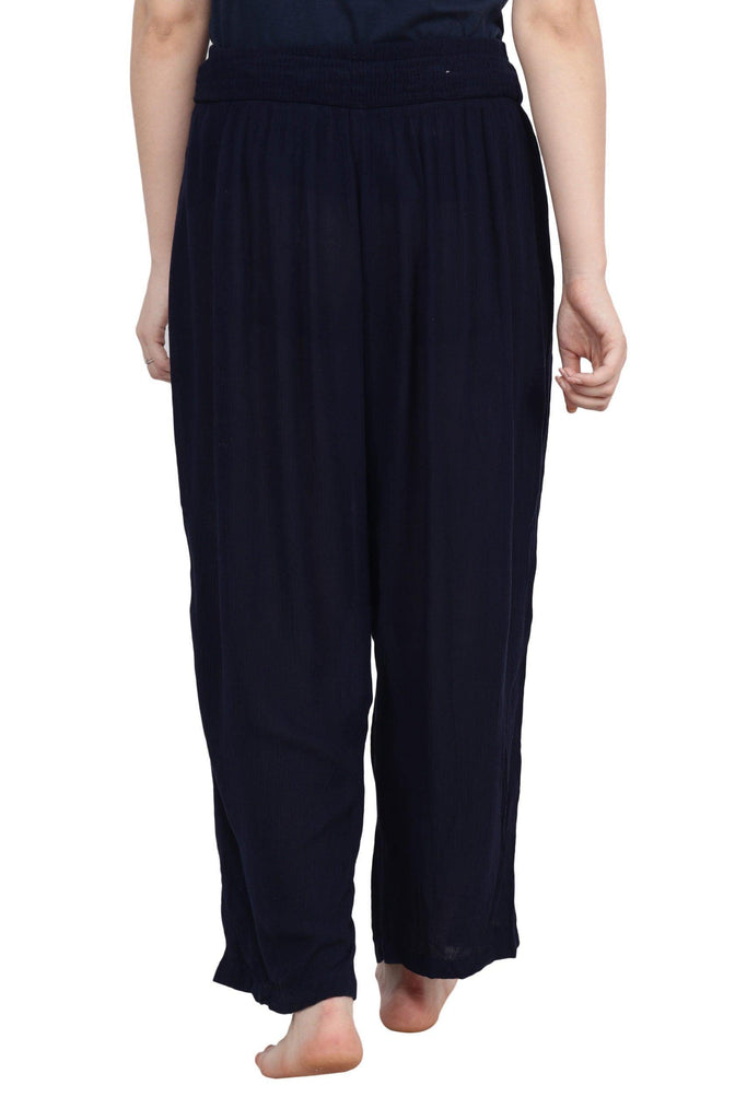 Model wearing Viscose Crepe Trousers with Pattern type: Solid-6