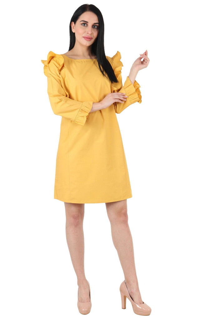 Model wearing Cotton Mini Dress with Pattern type: Solid-1